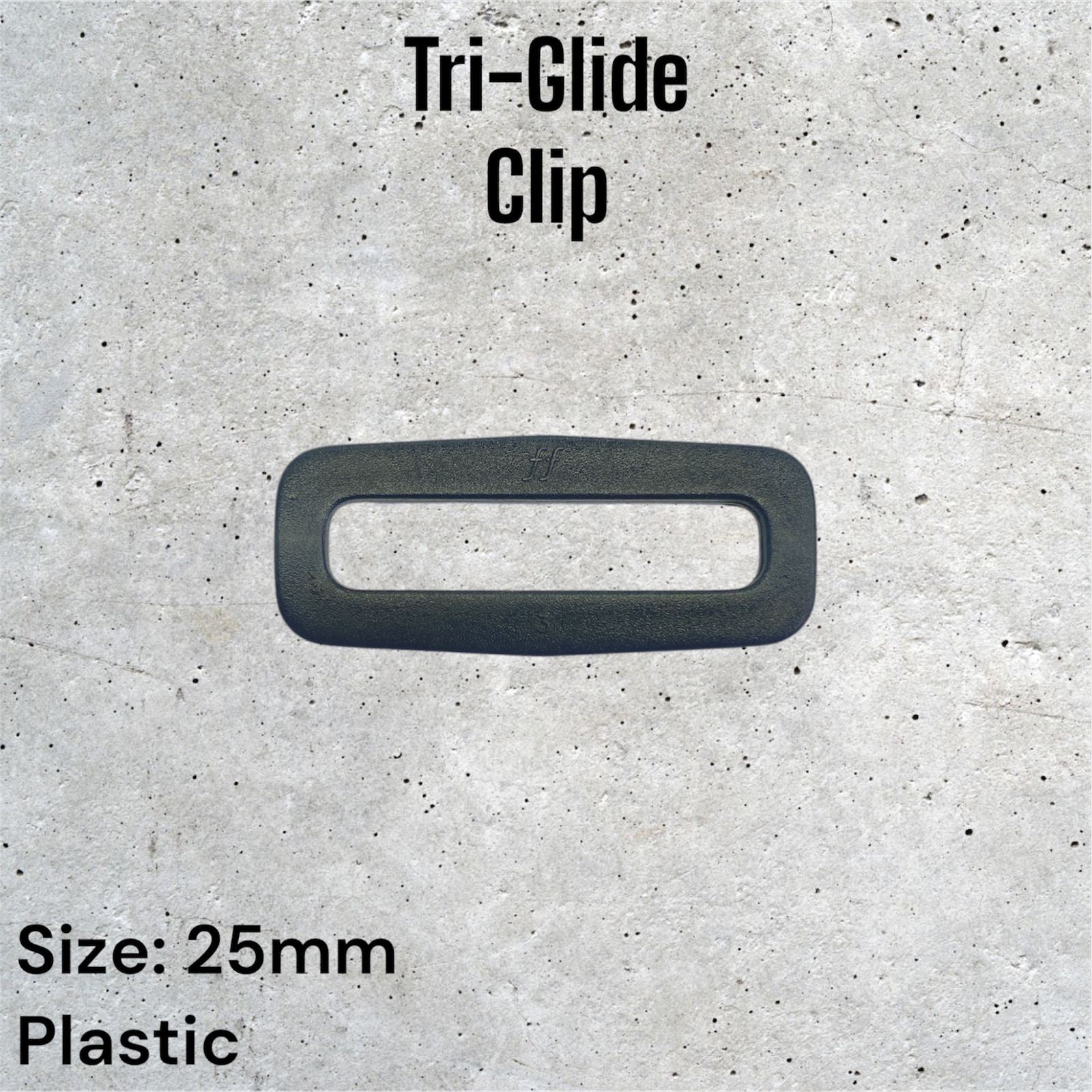 Black plastic Tri-Glide Clip, 25mm, shown on a light gray textured background.