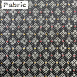 Black and silver patterned fabric with red and gold accents. Suitable for automotive upholstery.