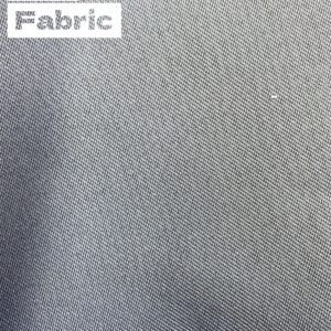 Close-up view of gray fabric texture with subtle diagonal weave. The words 'Car Fabric' are visible in a watermark-like 